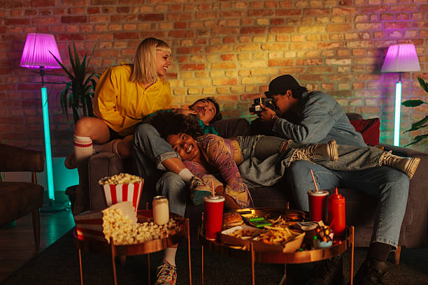 istock Friends taking polaroid indoors. 2237144509