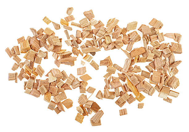 istock Wooden chips for smoking meat and fish isolated on a white background, top view.Chips for smoking or recycling. 2237155639