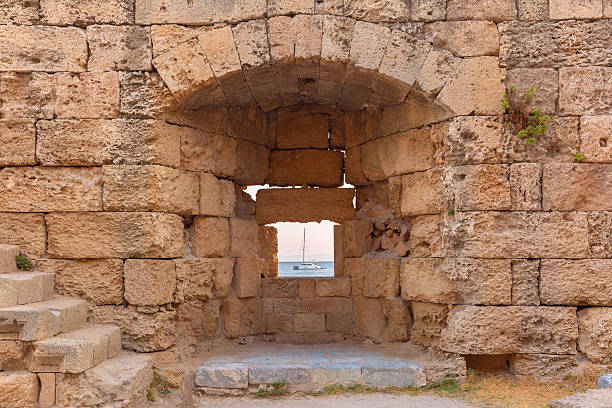 istock Ancient stone wall window in Rhodes Greece 2237160747
