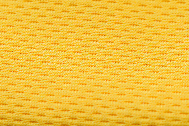Yellow cotton fabric texture background, seamless pattern of natural textile.