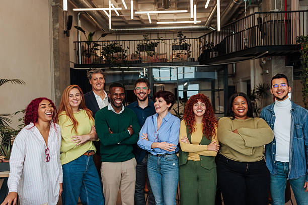 istock Start-up team smiling with folded arms in modern office 2237169922