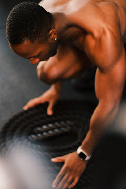 istock Smiling Athlete doing a Workout in Gym 2237175600