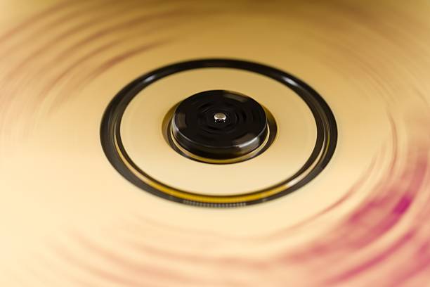 An old scratched 45 record isolated on white.Related: