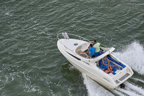 A family having some fun on their boat 