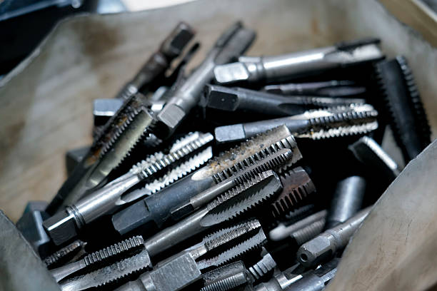 istock A grouping of shiny, metal threading taps are collected in a box. These tools are used for mechanical work and show signs of wear and tear, hinting at their previous use 2237179521