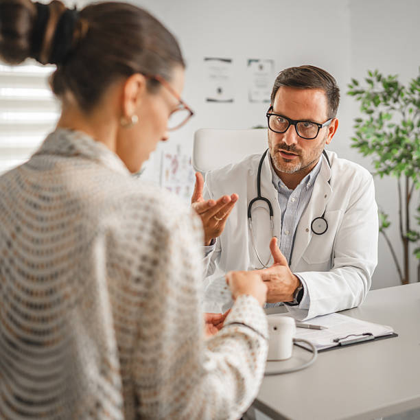 istock Doctor preparing blood pressure cuff for patient checkup 2237183548