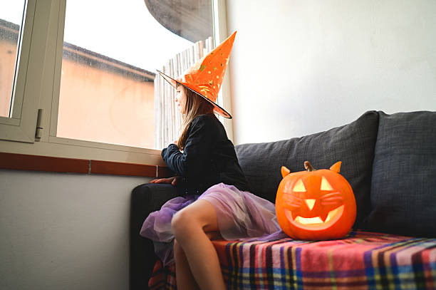 istock Girl in witch costume waiting for halloween 2237187512