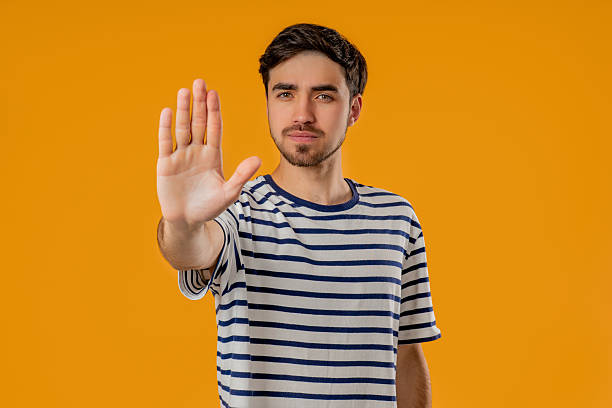 istock Uninterested Handsome Mature Man Disapproving With Stop Hand Sign. Dont Play 2237194765