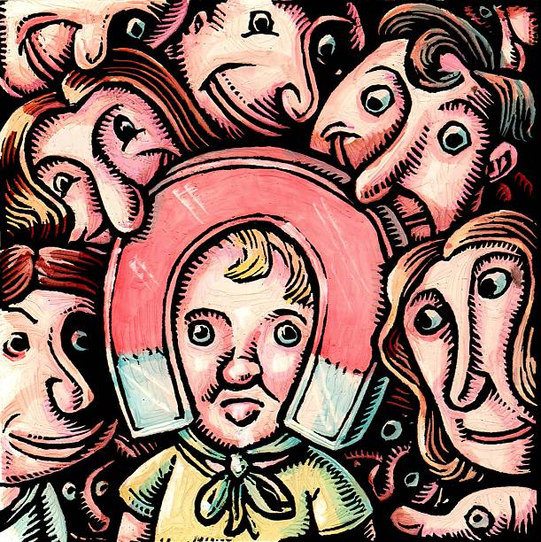The magnetism of babies: a magnet-shaped bonnet on a little blond toddler.