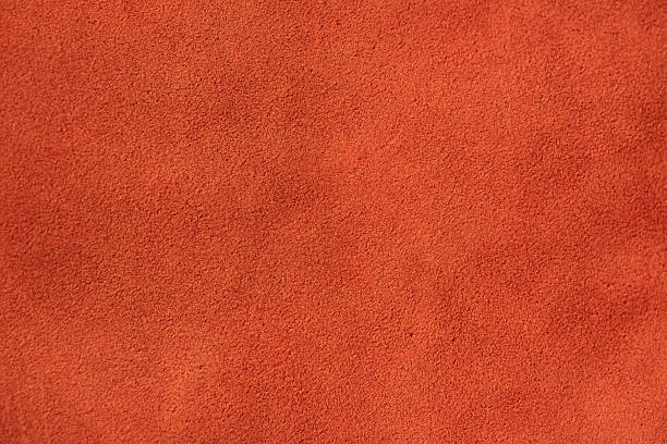 istock Red suede with a warm tint macro photo as a background. 2237206368
