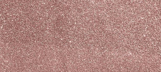 istock Abstract rose gold pink glitter sparkle texture background 2237211703