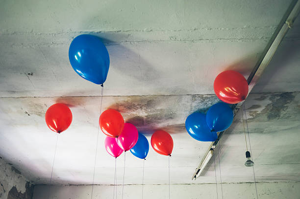 helium red balloons on red background
