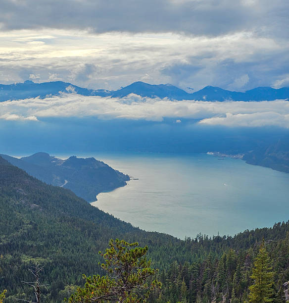 istock Howe Sound Aerial View with Mountains and Clouds 2237219918
