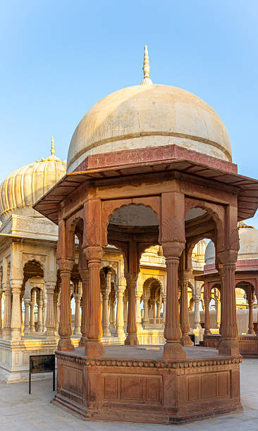 istock Ancient Stone Cenotaphs with Ornate Domes and Pillars at Sunset 2237231515
