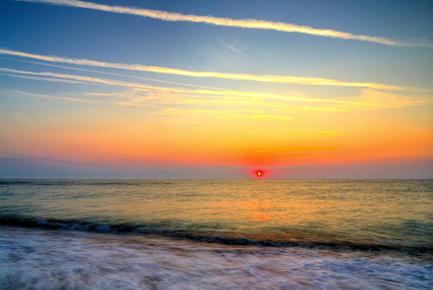Beautiful summer sunrise over the beach