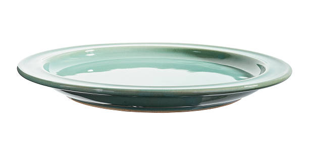 istock Turquoise Ceramic Plate with Glossy Finish, Side Angle View, Isolated on White Background with Clipping Path 2237234883