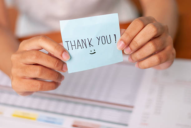 istock Gratitude message sticky note office desk bright environment close-up viewpoint appreciation concept 2237235213