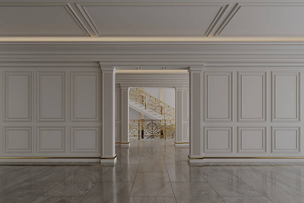 istock Elegant neoclassical interior with marble floor, white columns and golden staircase 2237236750