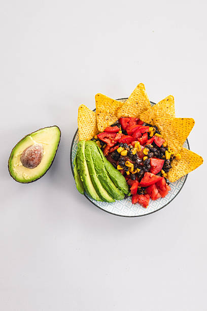istock healthy nachos with corn black beans tomato avocado and corn chips 2237236771