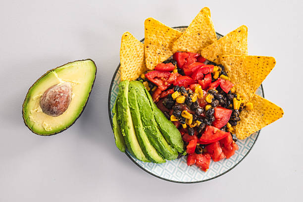 istock healthy nachos with corn black beans tomato avocado and corn chips 2237236791