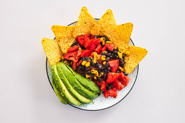 istock healthy nachos with corn black beans tomato avocado and corn chips 2237236866
