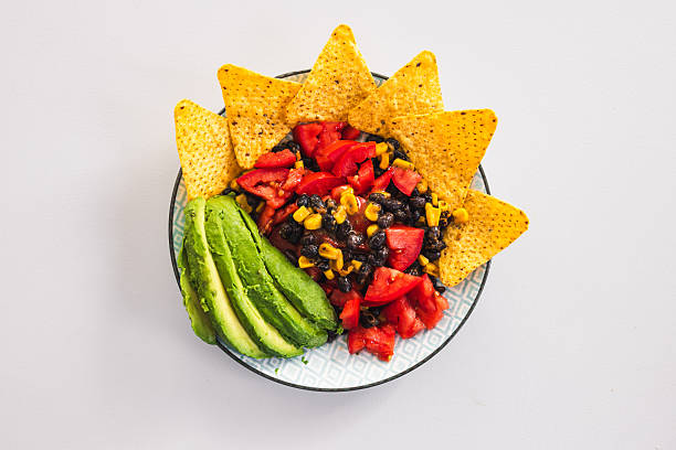 istock healthy nachos with corn black beans tomato avocado and corn chips 2237236869