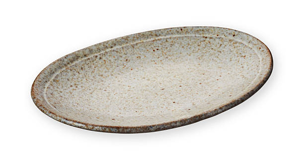 istock Handmade Rustic Ceramic Plate with Natural Speckled Glaze Isolated on White Background with Clipping Path 2237241686