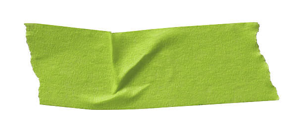 istock green crumpled torn tape isolated on white background. 2237248380