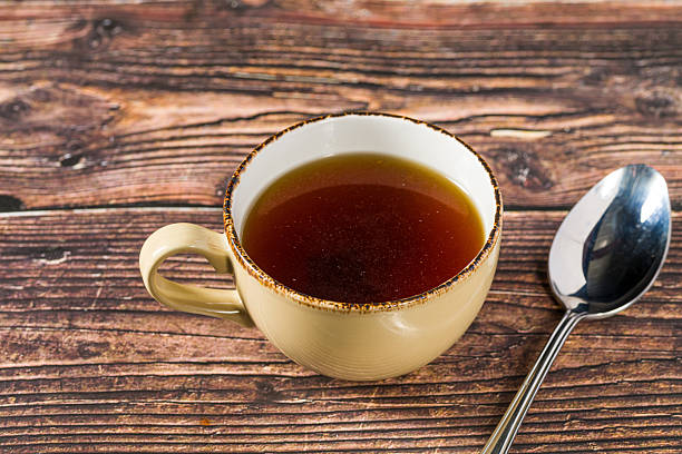 istock Hot consomme beef tail served in ceramic cup on rustic wooden table 2237250993