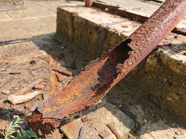 istock Examples of physical weathering: rusting iron, rusting iron, metal that is oxidized becomes weathered. 2237252811