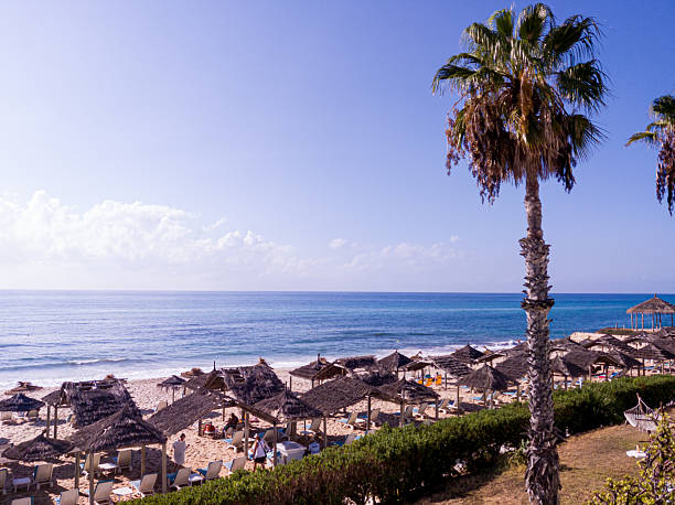 istock View to a beach, umbrellas and blue sky 2237254413