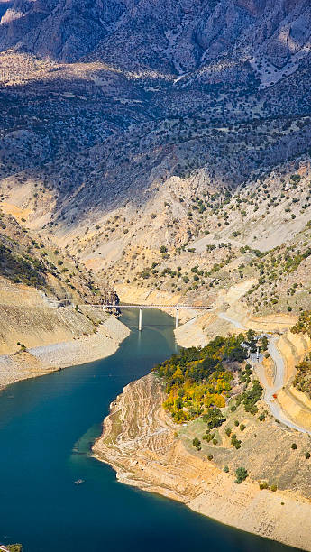 istock Winding River in Autumn Mountains 2237255017