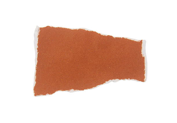 istock Pieces of torn or cut brown paper, design elements isolated on white background  with clipping path. 2237258248