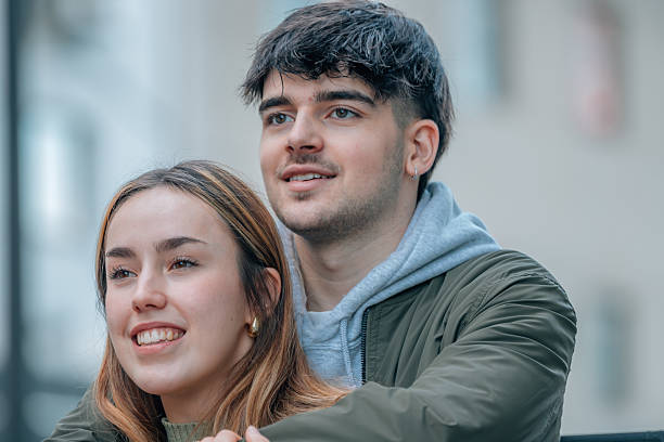 istock wedding couple hugging on the street 2237258308