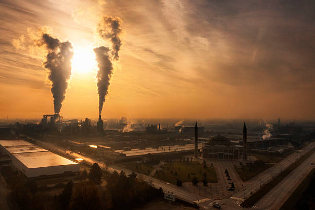 istock FACTORYIndustrialization and environmental impacts, chimney smoke, cities and industry, contribution to the economy, environmental pollution, production and imports, exports, contribution to the economy 2237264872