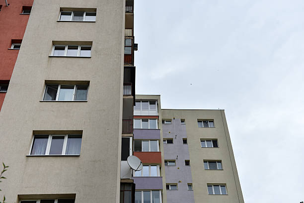 istock Typical facade of concrete panel building. Post Soviet flat of blocks 2237265013
