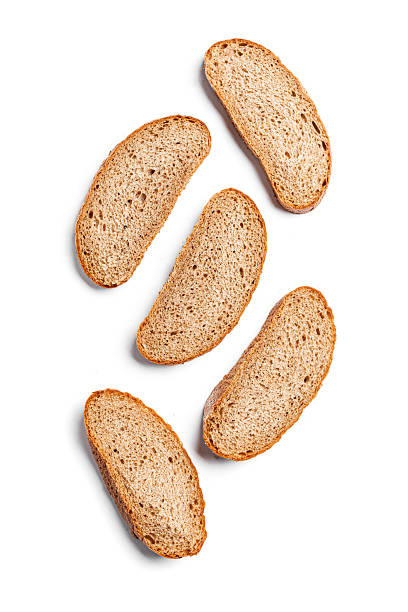 istock Slices of wheat bread isolated on white background 2237272439