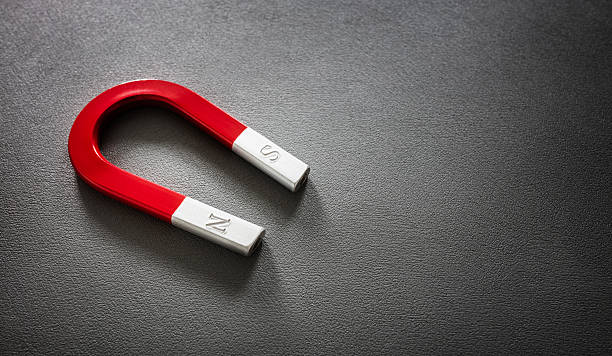 istock Horseshoe magnet on black background 2237279804