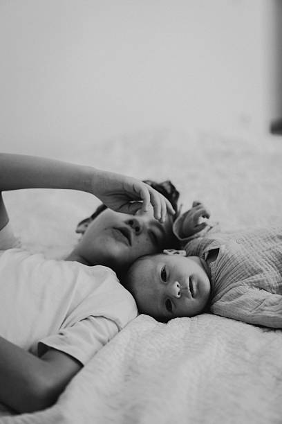 istock Two brothers enjoying playing in cozy bright bedroom 2237280644