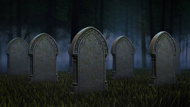 istock Old Gravestones in Foggy Forest Cemetery 2237285771