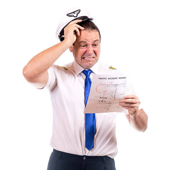 istock Emotional pilot looking at plane crash report, isolated on white background. 2237287273
