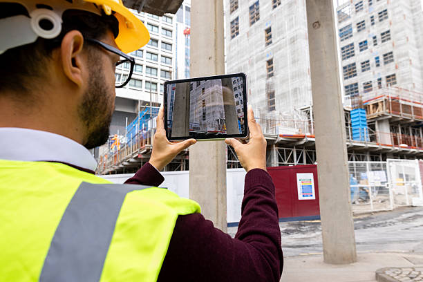 istock Taking Photos of Construction Site 2237289843