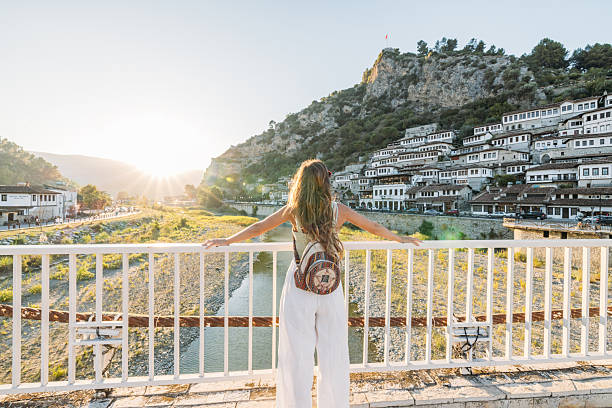 istock Woman Enjoying Scenic View from Bridge 2237296202