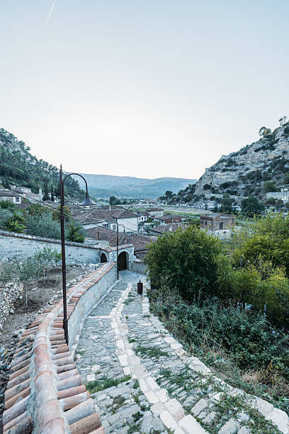 istock Narrow Stone Pathway Through Mountain Village 2237296244