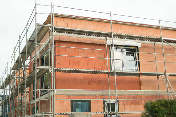 istock Construction of apartment buildings represents urban growth, housing development 2237300962