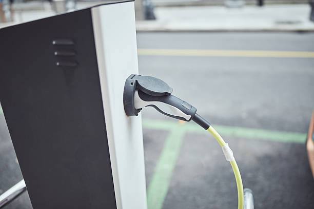 istock Charging electric vehicle on a public charger. 2237303792