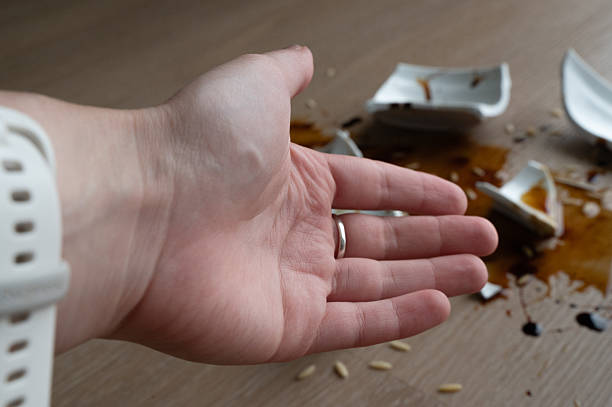 istock A Broken Ceramic Dish with Spilled Sauce Accidentally Laid on a Wood Dining Table 2237304423