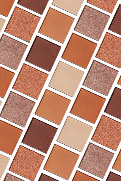 istock Cosmetics texture pattern, makeup palette vivid neutral color eye shadow, square eye powder swatches. Female cosmetic and beauty products, aesthetic minimal beauty photo, colorful eyeshade top view 2237305703