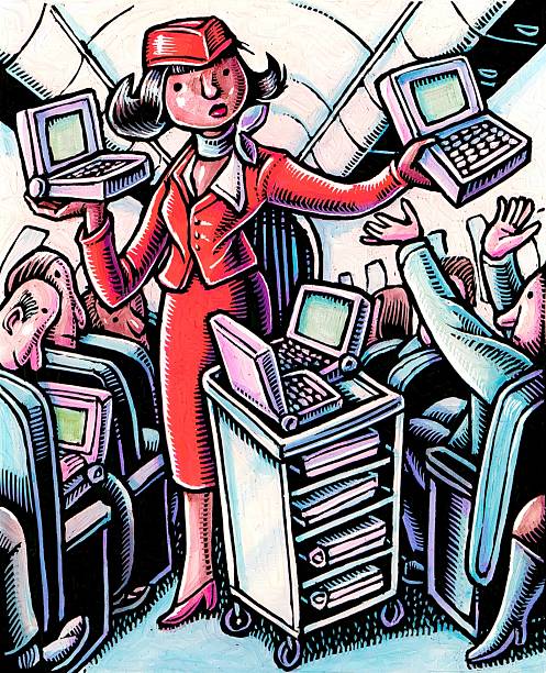 stewardess on airplane hands out laptop computers from a cart