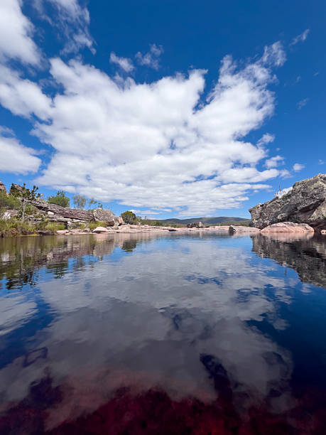 istock Scenic Rock Landscape with Clouds Reflected on Calm Water 2237317106